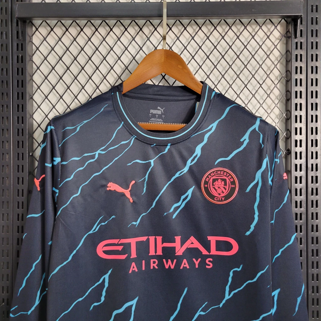 Camisa do Manchester City Manga Longa 2023-2024 Camisa do Manchester City Manga Longa 2023-2024