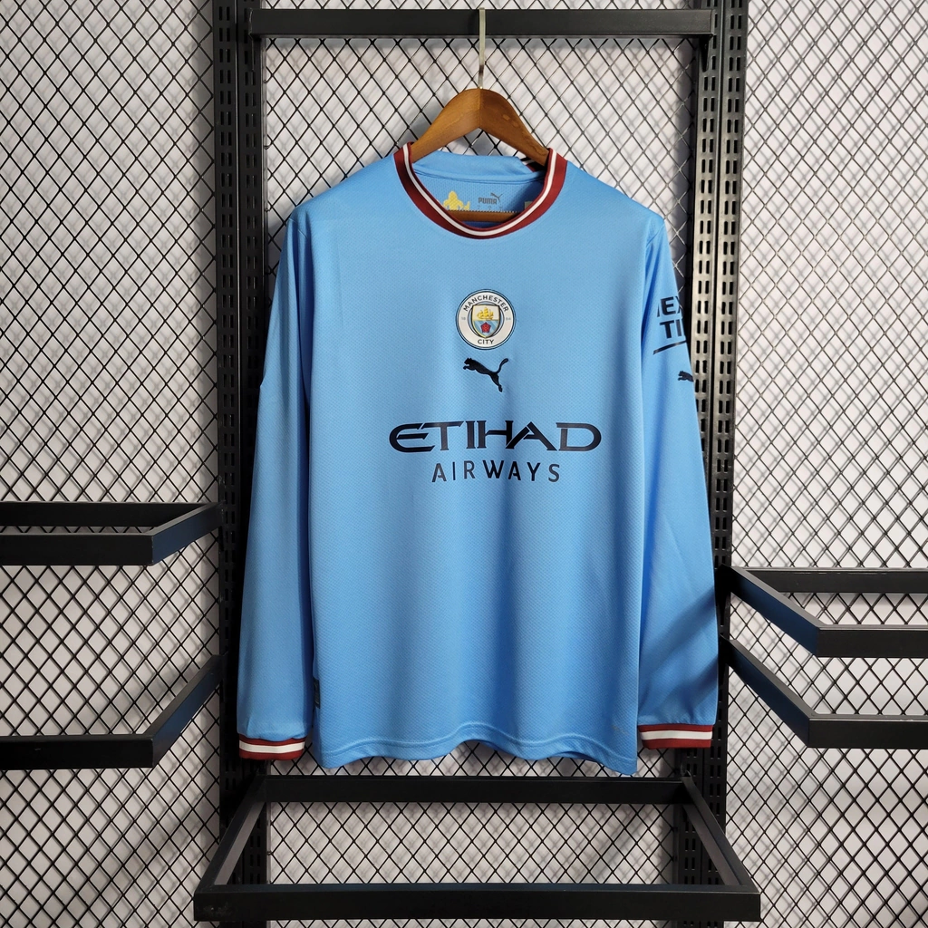 Camisa do Manchester City Manga Longa 2022-2023 Camisa do Manchester City Manga Longa 2022-2023