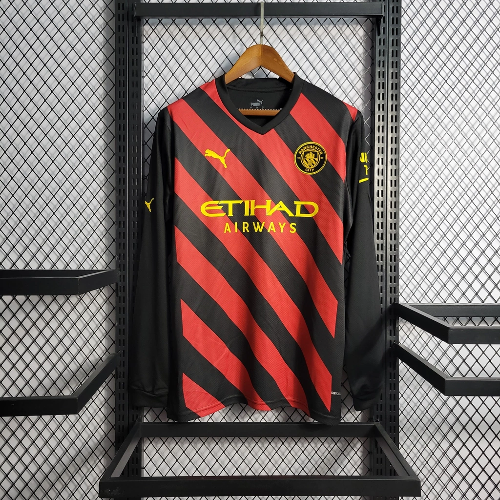 Camisa do Manchester City Manga Longa 2022-2023 Camisa do Manchester City Manga Longa 2022-2023