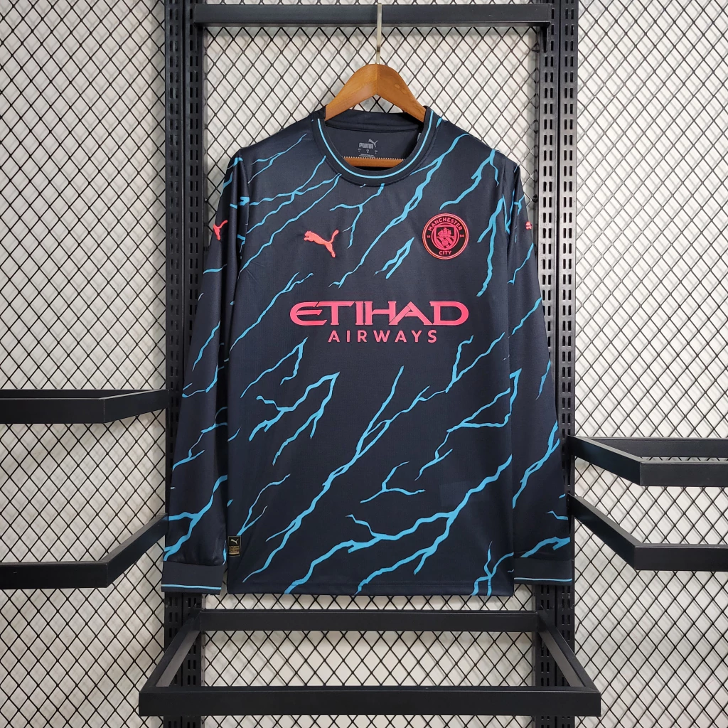 Camisa do Manchester City Manga Longa 2023-2024 Camisa do Manchester City Manga Longa 2023-2024