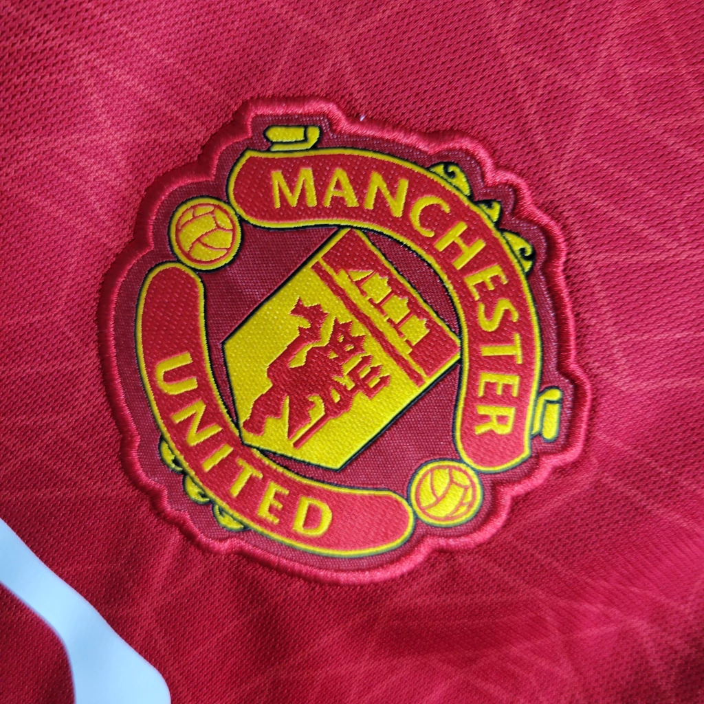 Camisa do Manchester United Manga Longa 2023-2024 Camisa do Manchester United Manga Longa 2023-2024