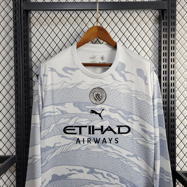 Camisa do Manchester City Manga Longa EE 2024-2025 Camisa do Manchester City Manga Longa 2024-2025